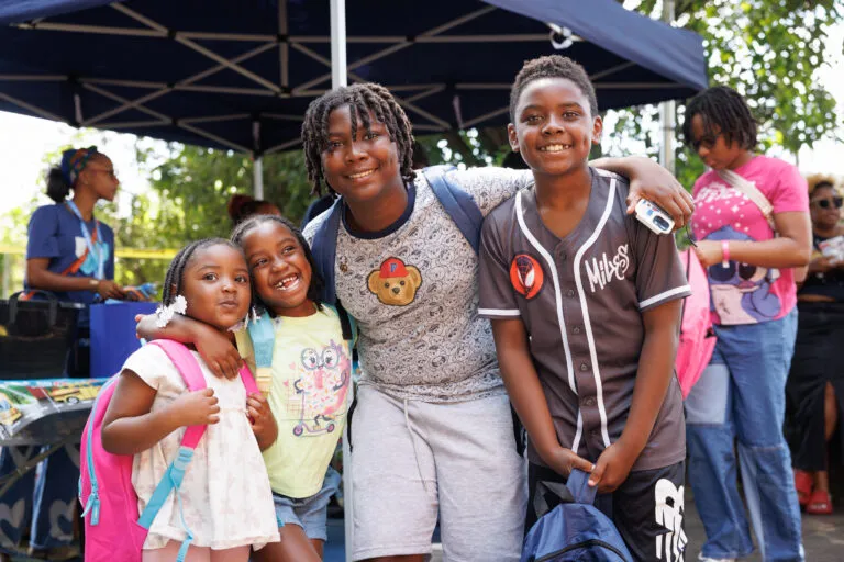 Four children smiling